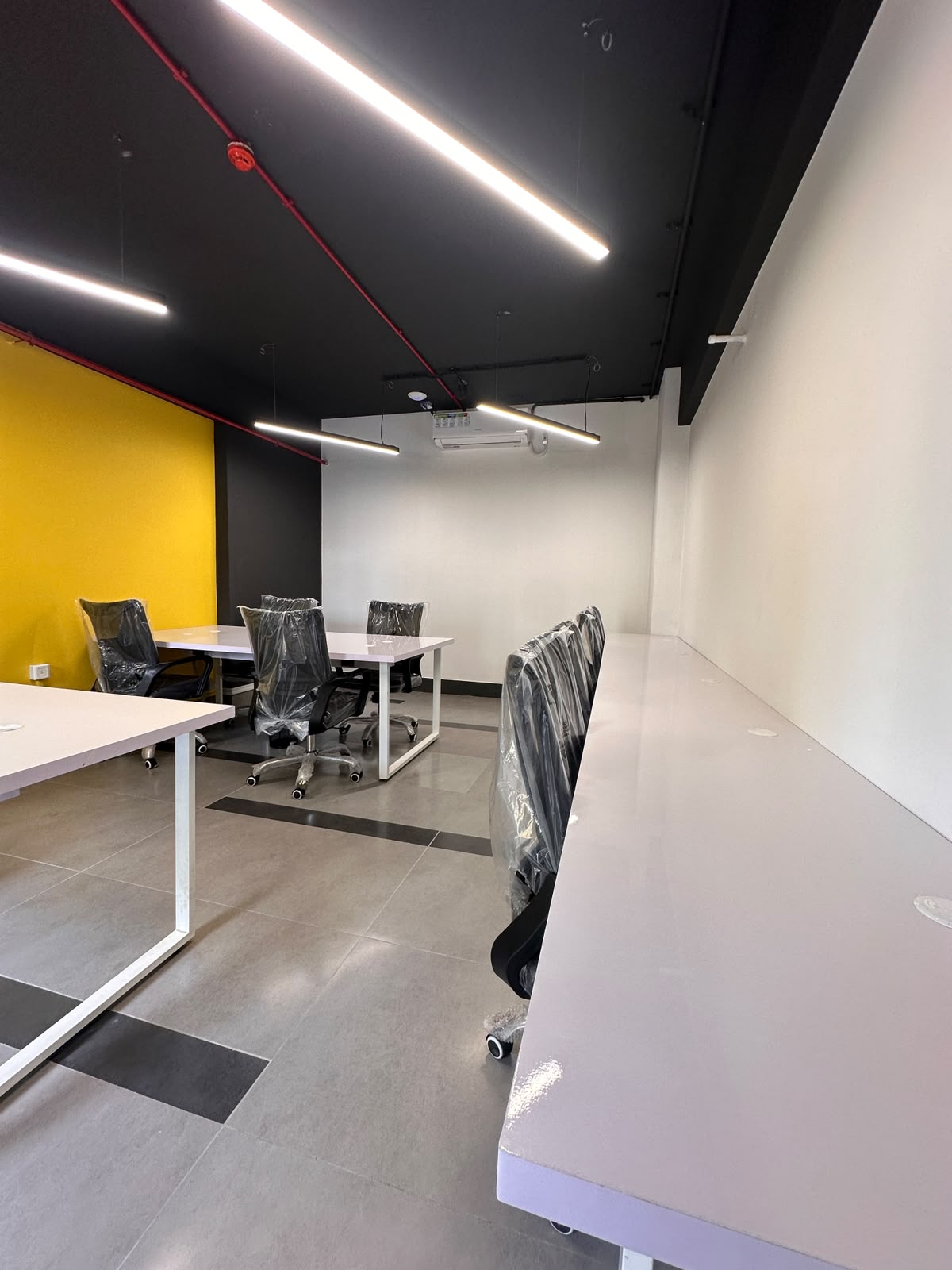 Private office suite with team desks at WorkMore, The Pavilion Karachi
