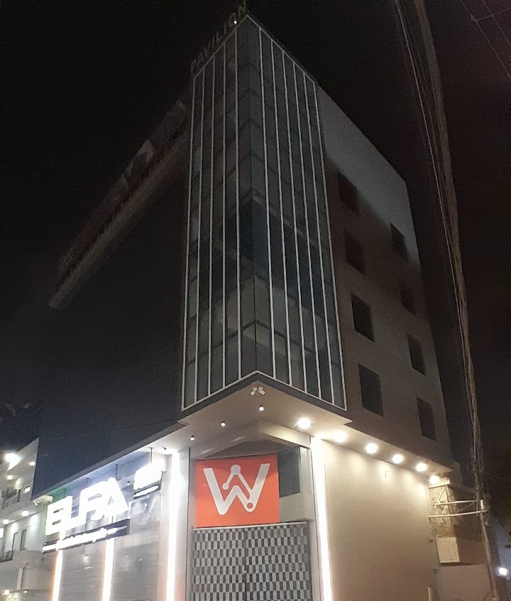 WorkMore Pavilion building exterior at night, Karachi