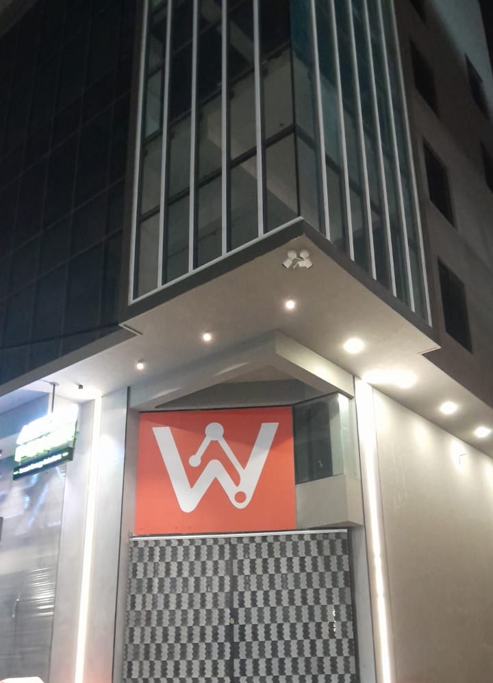 WorkMore entrance with branded W signage at The Pavilion