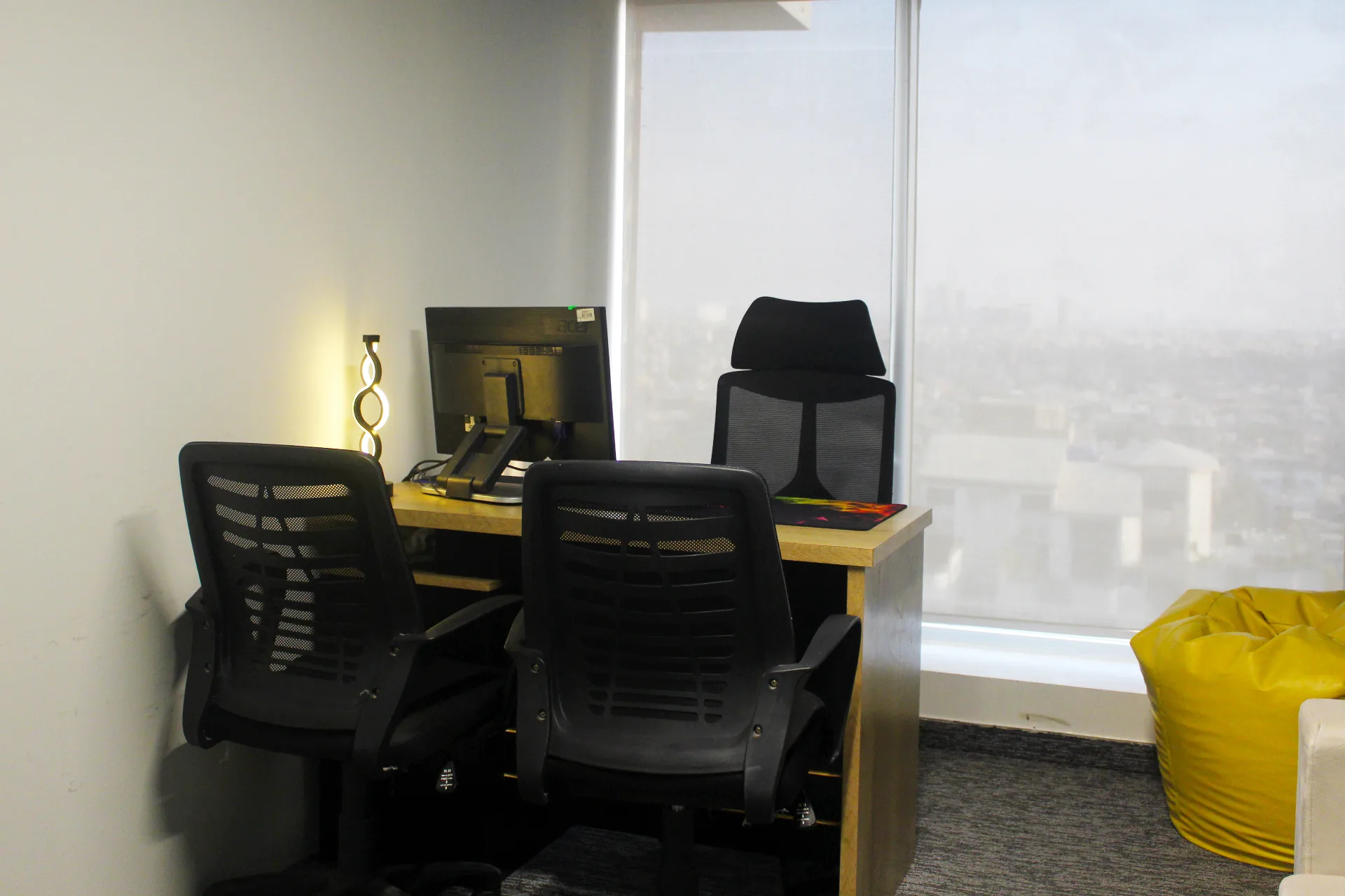 Fortune Tower private office with window view